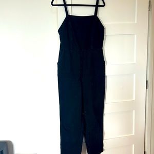 Black denim jumpsuit- flattering!